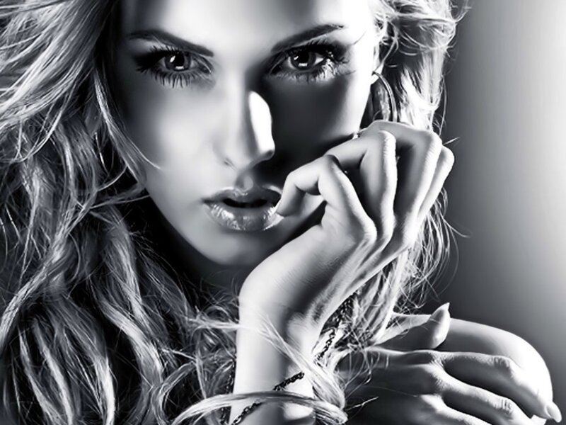 woman with hand on chin