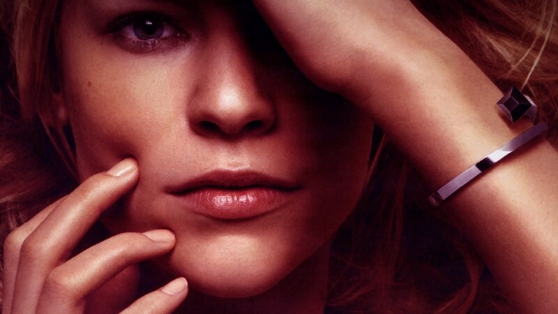 woman with hand on face