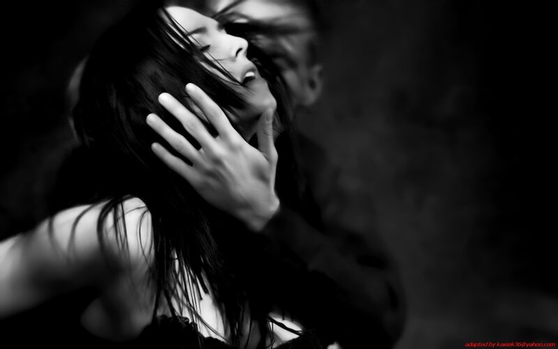 woman with hand on face