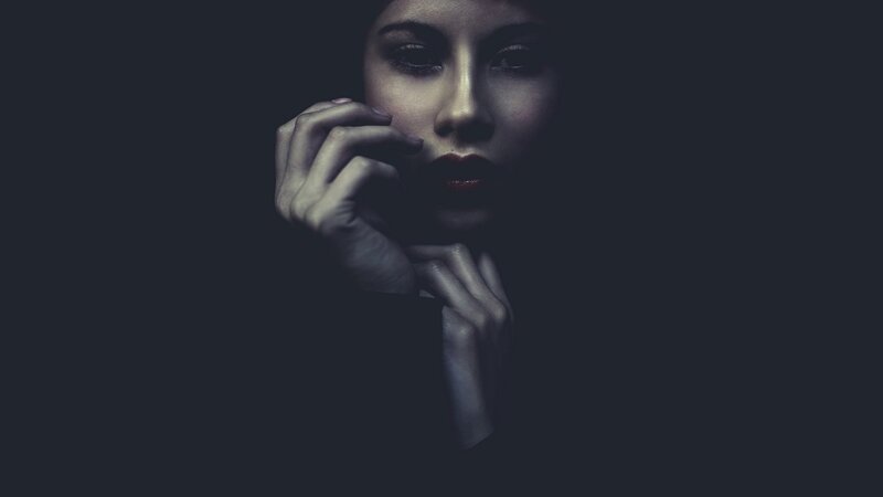 Woman with Hand on Face — Black, Dramatic, Night, Photograph