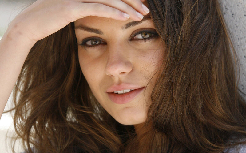 woman with hand on forehead