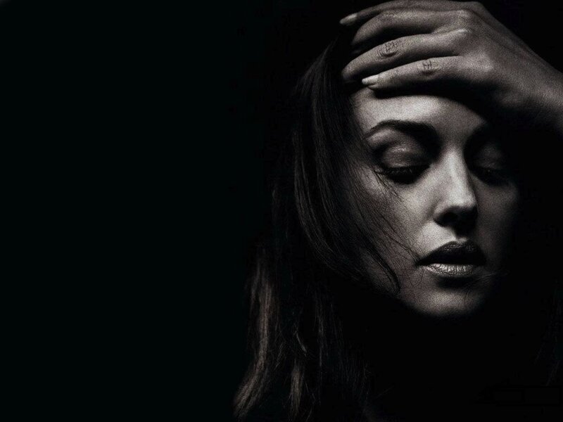 woman with hand on forehead
