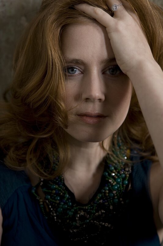 woman with hand on forehead