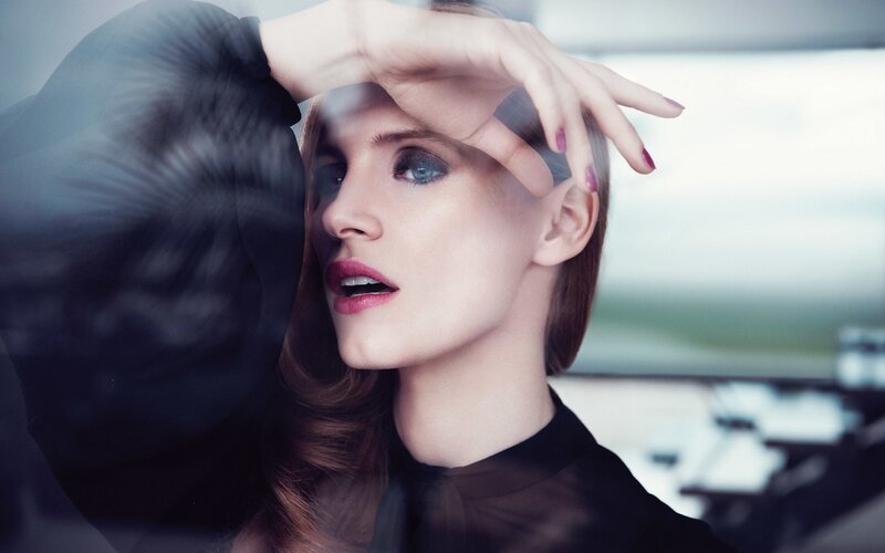 woman with hand on forehead