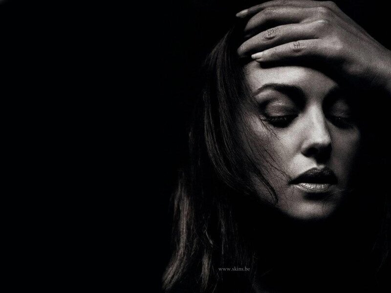 woman with hand on forehead