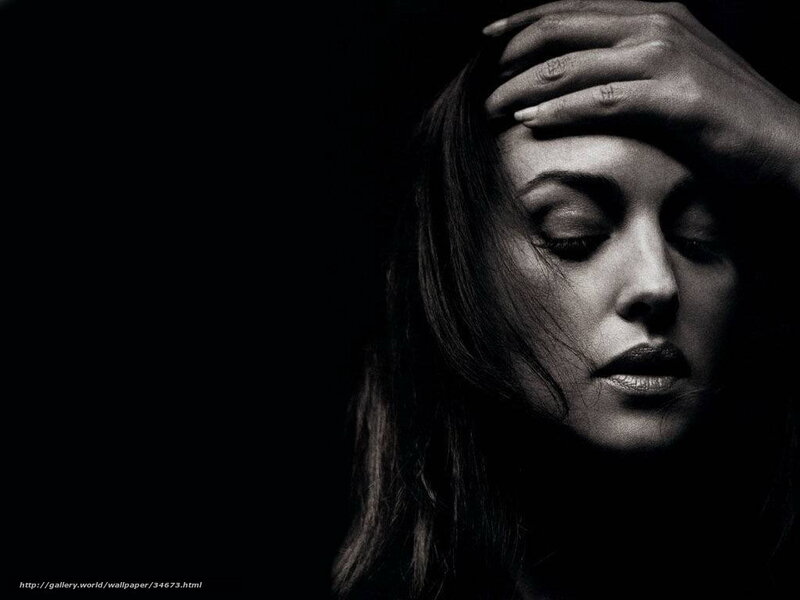 woman with hand on forehead