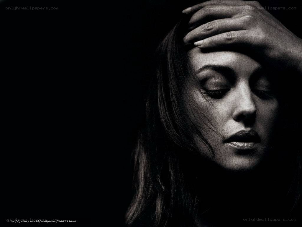 woman with hand on forehead