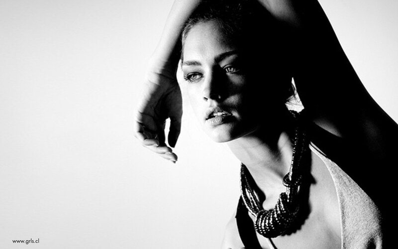 woman with hand on head
