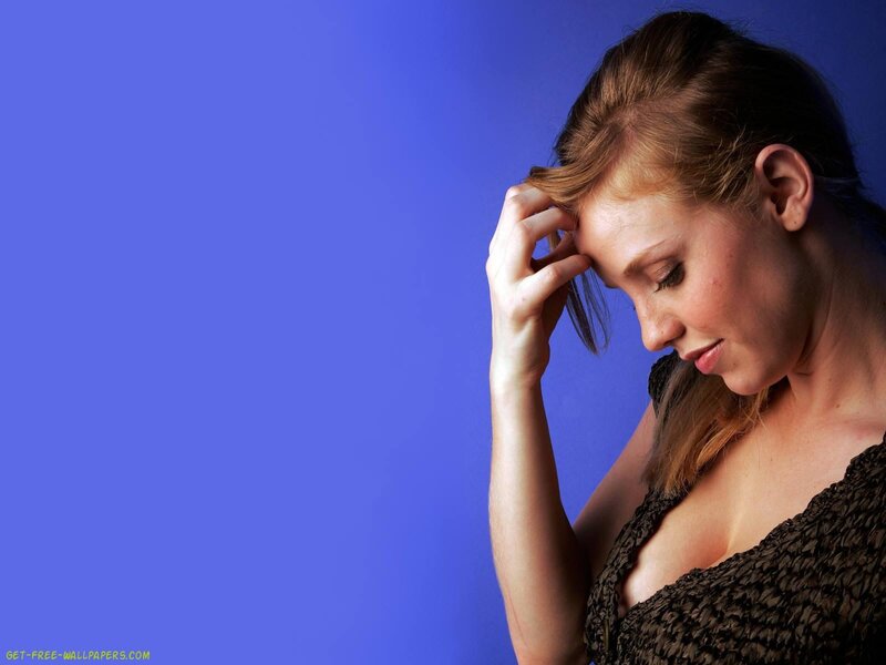 woman with hand on head