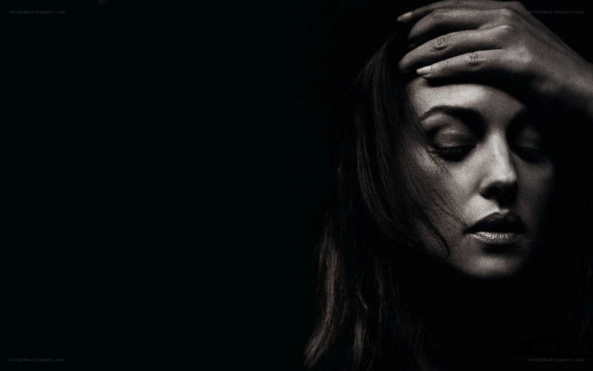 woman with hand on head
