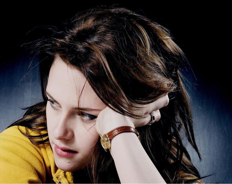 woman with hand on head