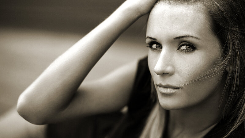Woman with Hand on Head — Black, Contemplative
