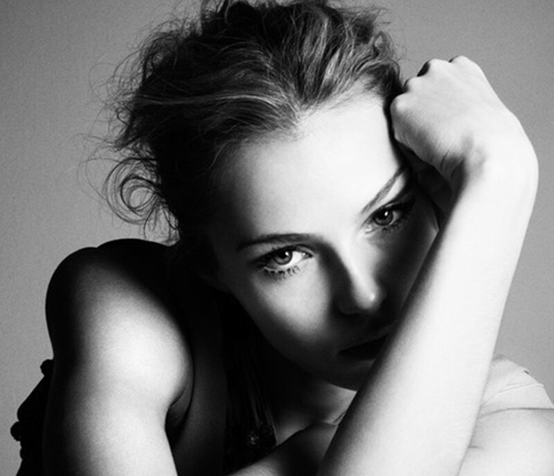 Woman with Hand on Head — Black, Dramatic, Photograph