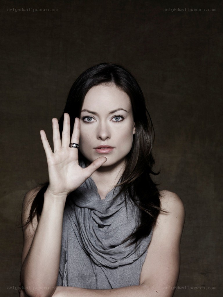 woman with hand raised