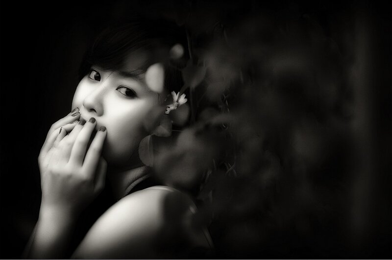 Woman with Hand to Face — Black, Dramatic