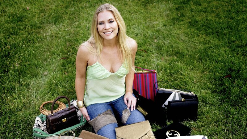 woman with handbags on grass