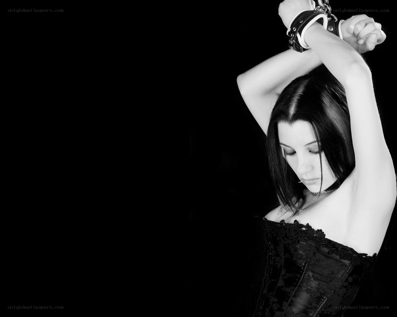 woman with handcuffed arms