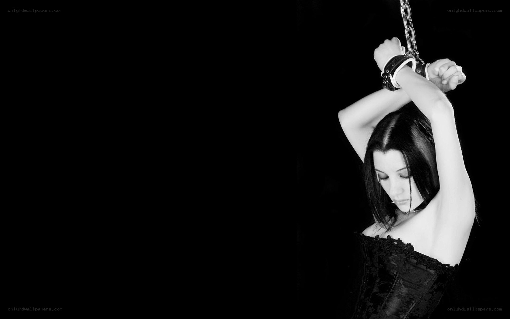 woman with handcuffed hands
