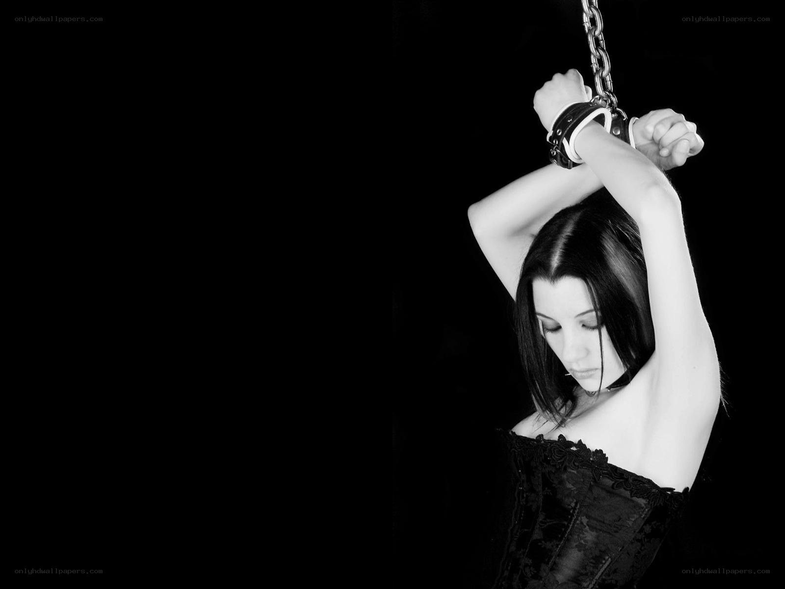 woman with handcuffed hands