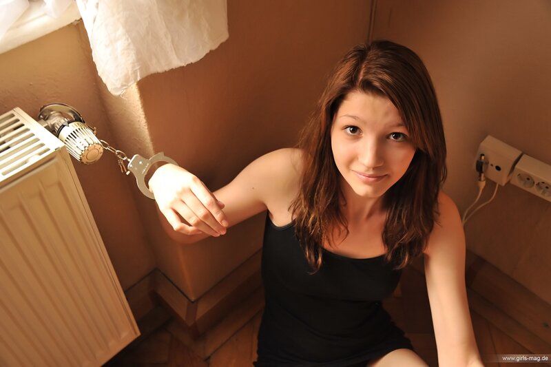 woman with handcuffs on radiator