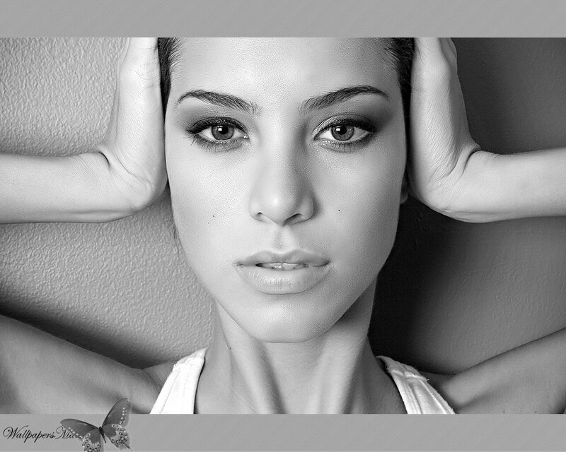 woman with hands behind head
