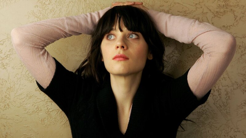 woman with hands behind head