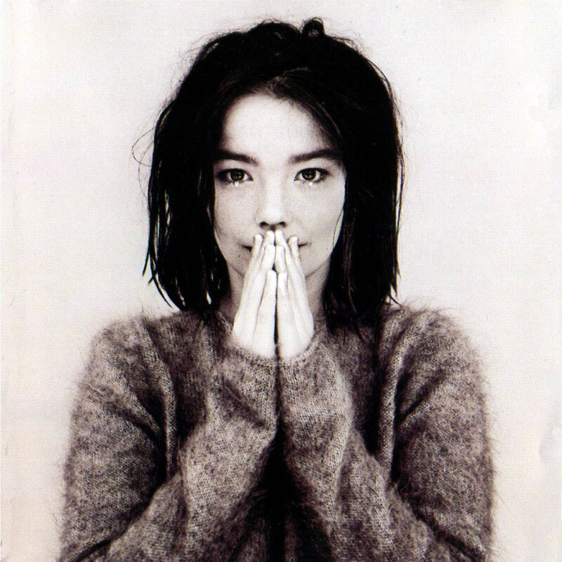woman with hands clasped
