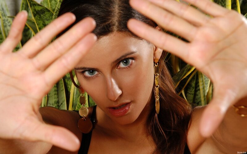 woman with hands framing face