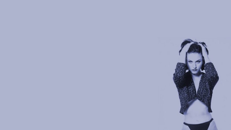 woman with hands in hair