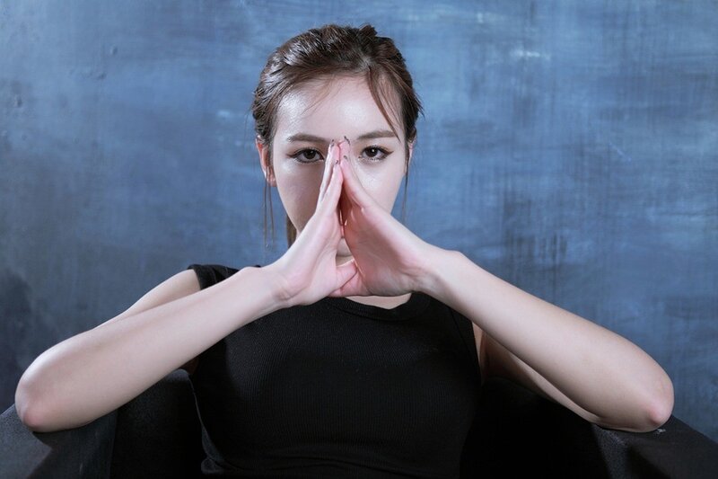 Woman with Hands in Prayer Pose — Blue
