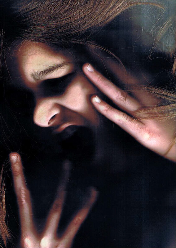 woman with hands on face