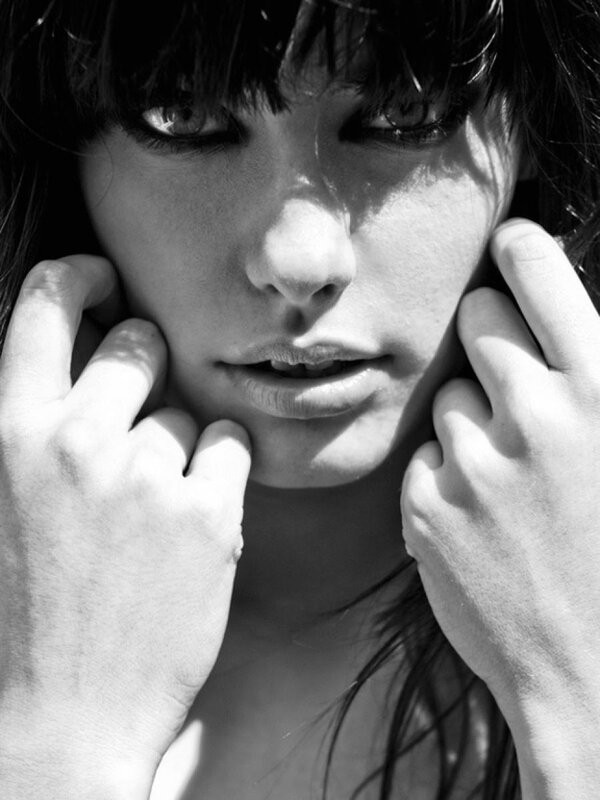 woman with hands on face