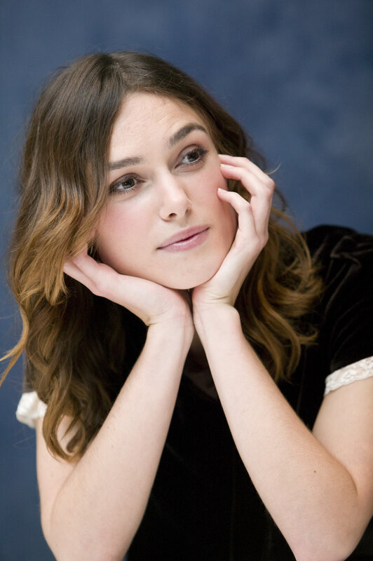 woman with hands on face