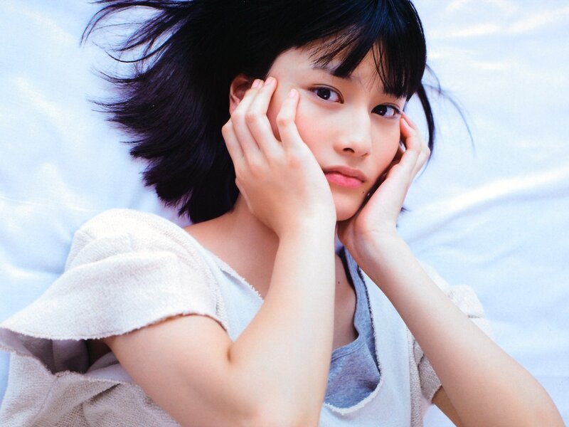 woman with hands on face