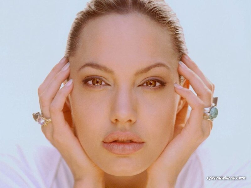 woman with hands on face