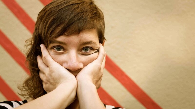 Woman with Hands on Face — Brown, Neutral