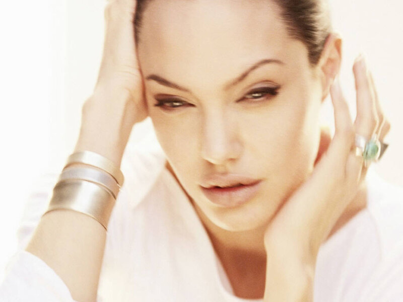 Woman with Hands on Face — White, Contemplative