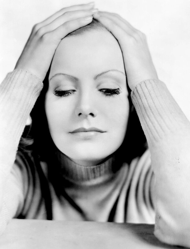 woman with hands on head