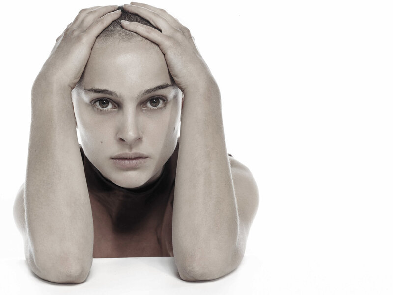 woman with hands on head