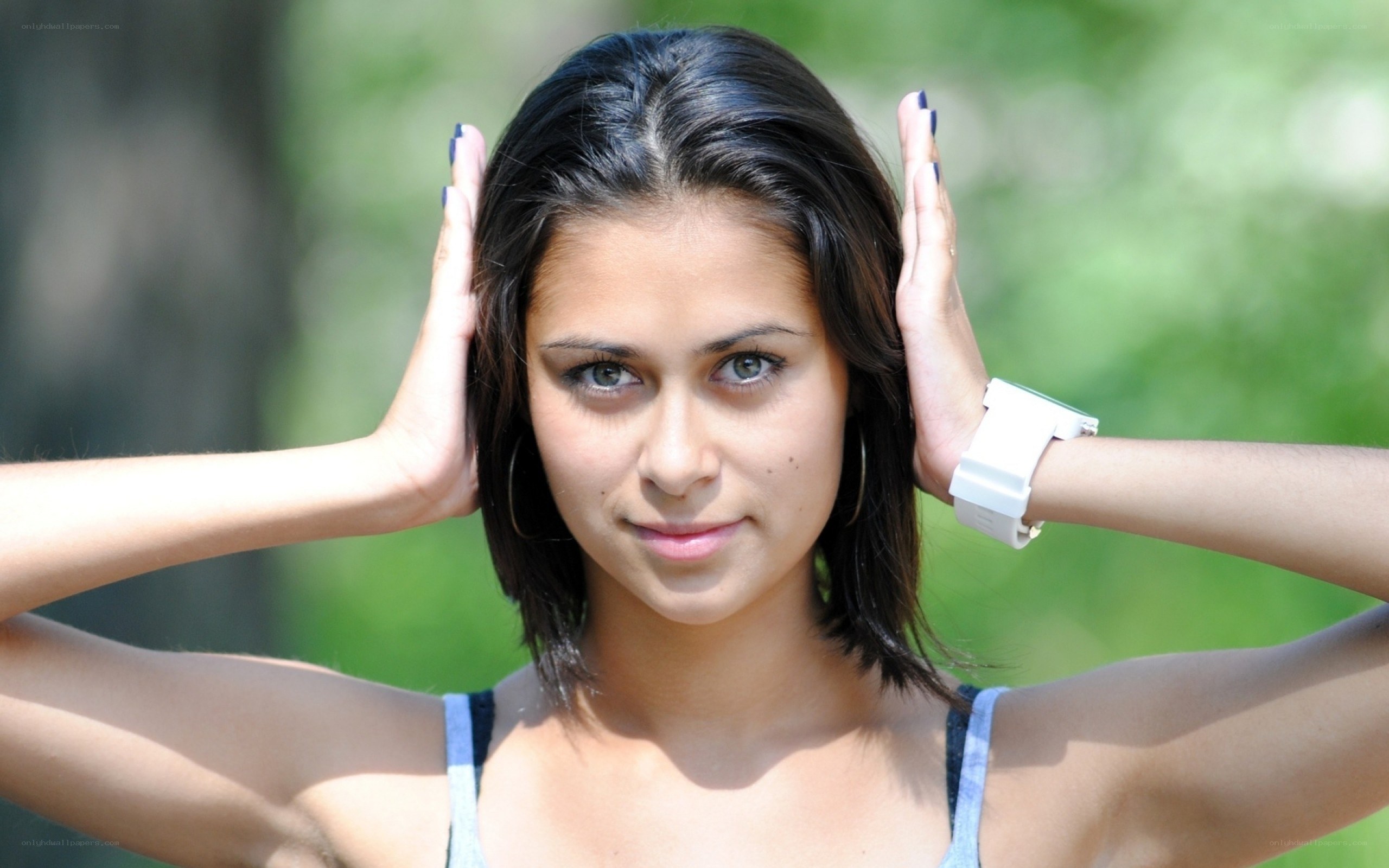 woman with hands on head