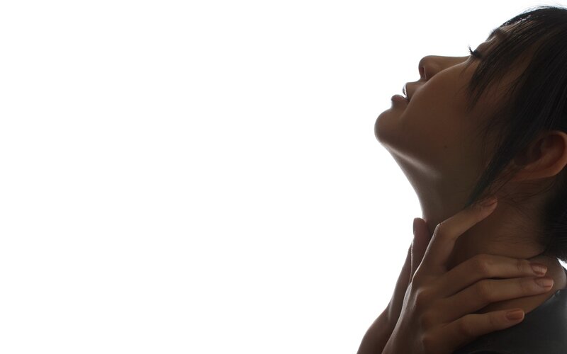 Woman with Hands on Neck — White
