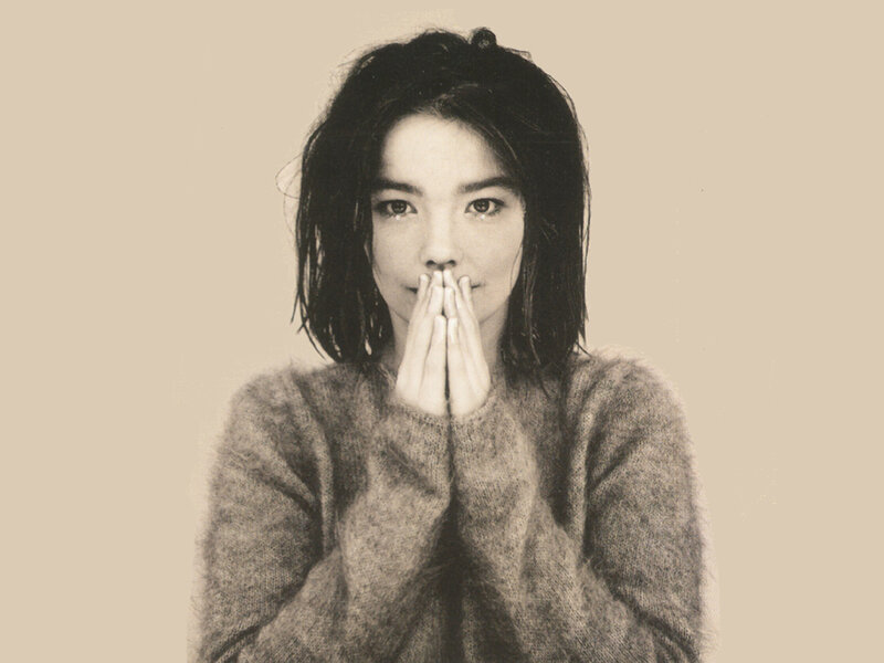 woman with hands over mouth