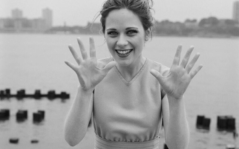 Woman with Hands Raised — Black, Playful, Photograph, Water