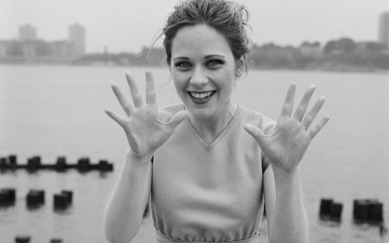 Woman with Hands Raised — Black, Playful