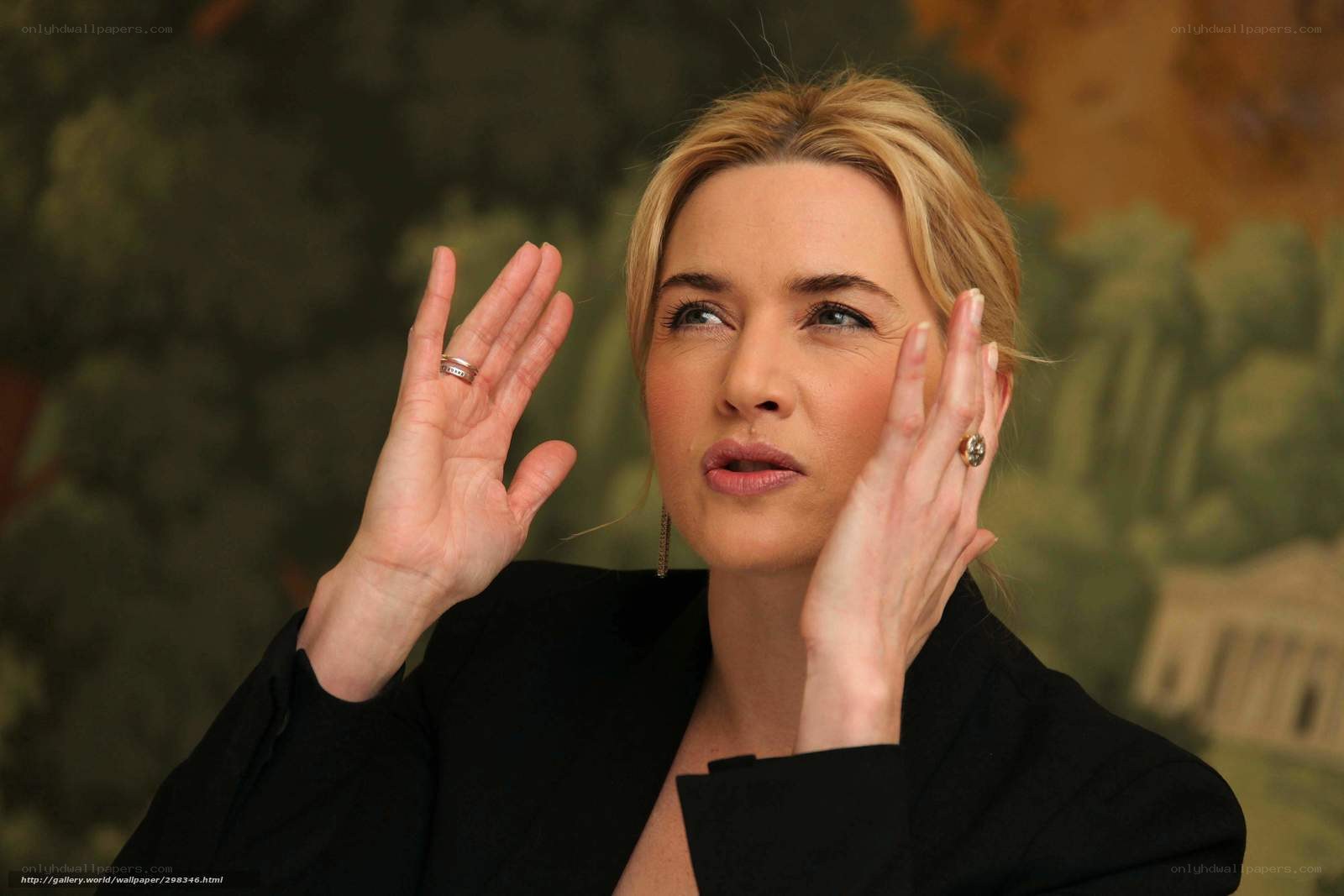 woman with hands raised