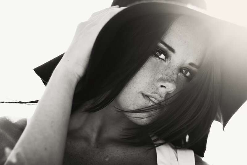 woman with hat and freckles