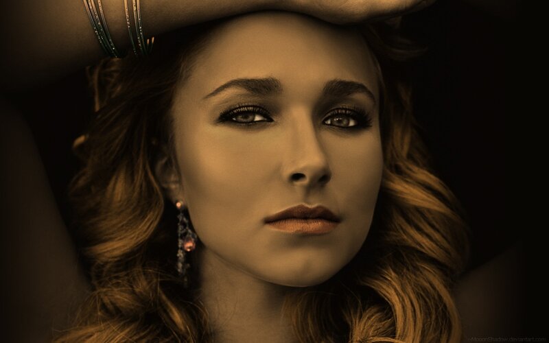 woman with hat and jewelry