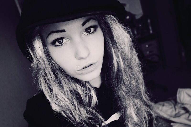 Woman with Hat and Lip Piercing