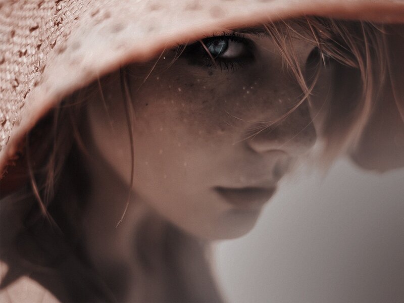 woman with hat in sepia