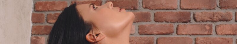 woman with head tilted back